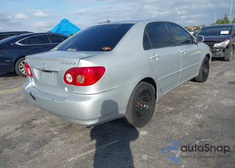2004 Toyota Corolla Le z USA, uszkodzony, nr VIN JTDBR32EX42024809